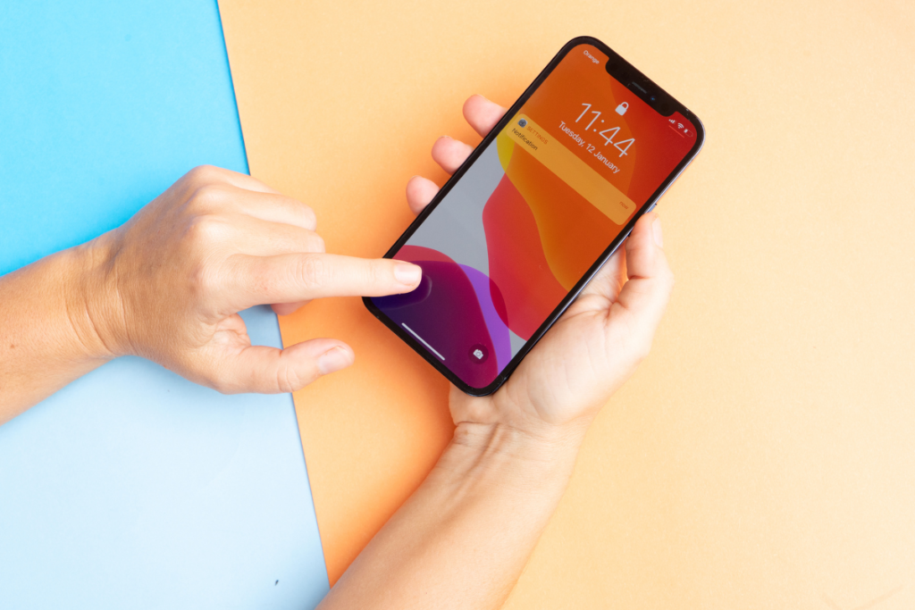 iPhone being swiped with a finger