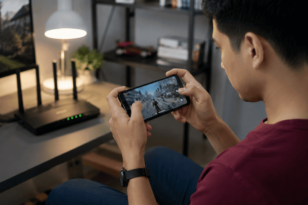 Person troubleshooting smartphone gaming