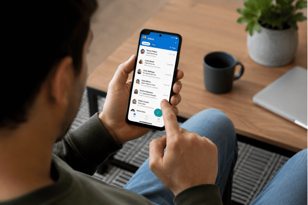person using Outlook email on Android phone